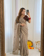 Staring Beige Fendy Silk Sequence Embroidery Work Saree With Stitched Blouse