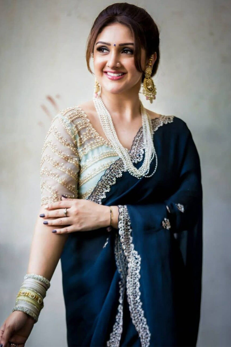 Serendipity Navy Blue Embroidery Work Georgette Saree With Appealing Blouse Piece