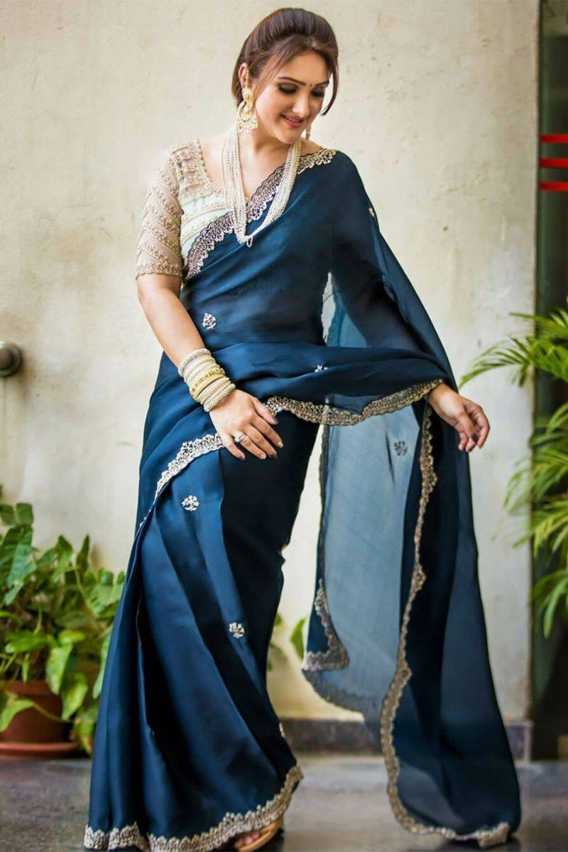 Serendipity Navy Blue Embroidery Work Georgette Saree With Appealing Blouse Piece
