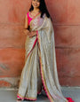Groovy Beige Tissue Silk Saree With Pulsating Blouse Piece