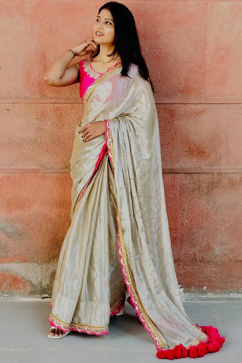 Groovy Beige Tissue Silk Saree With Pulsating Blouse Piece