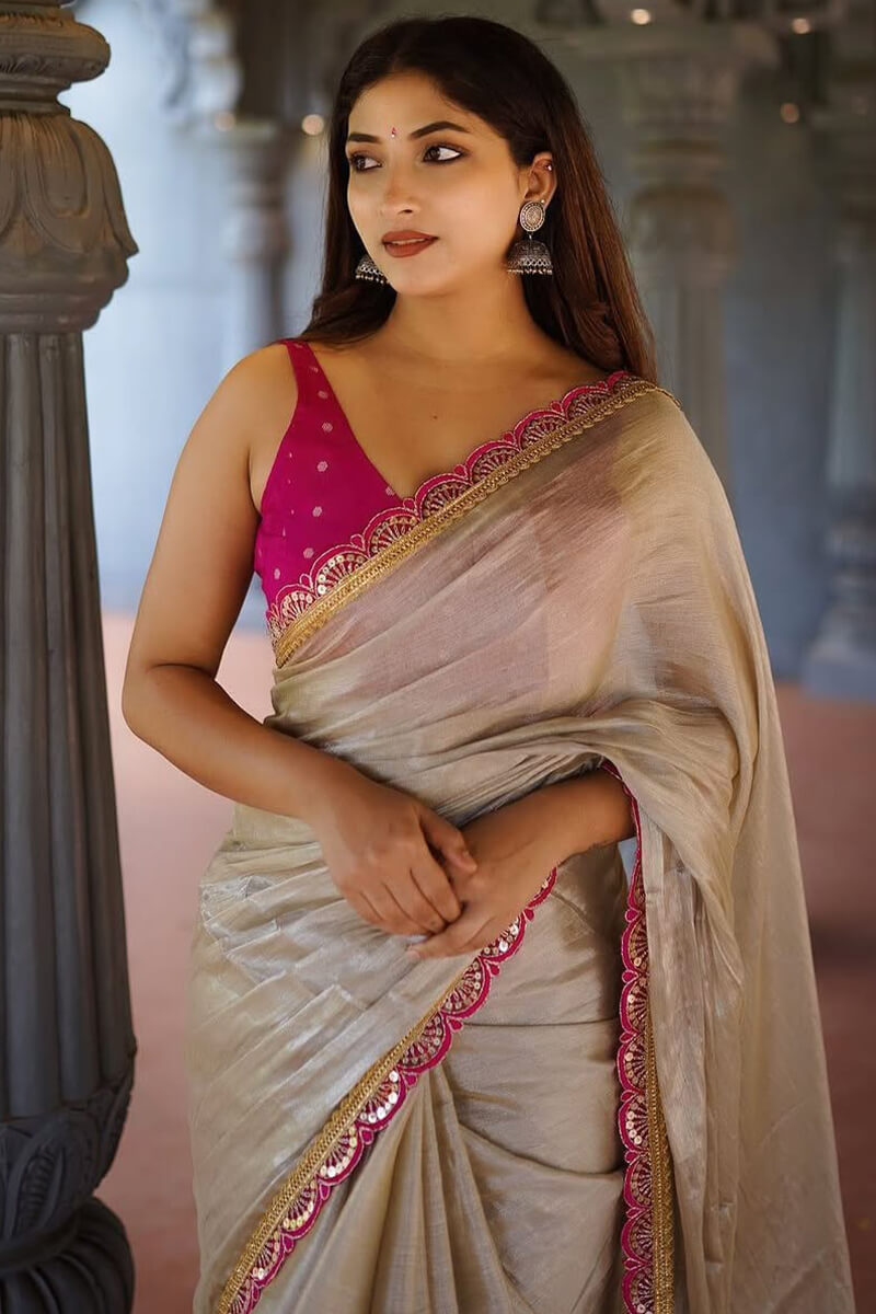 Groovy Beige Tissue Silk Saree With Pulsating Blouse Piece