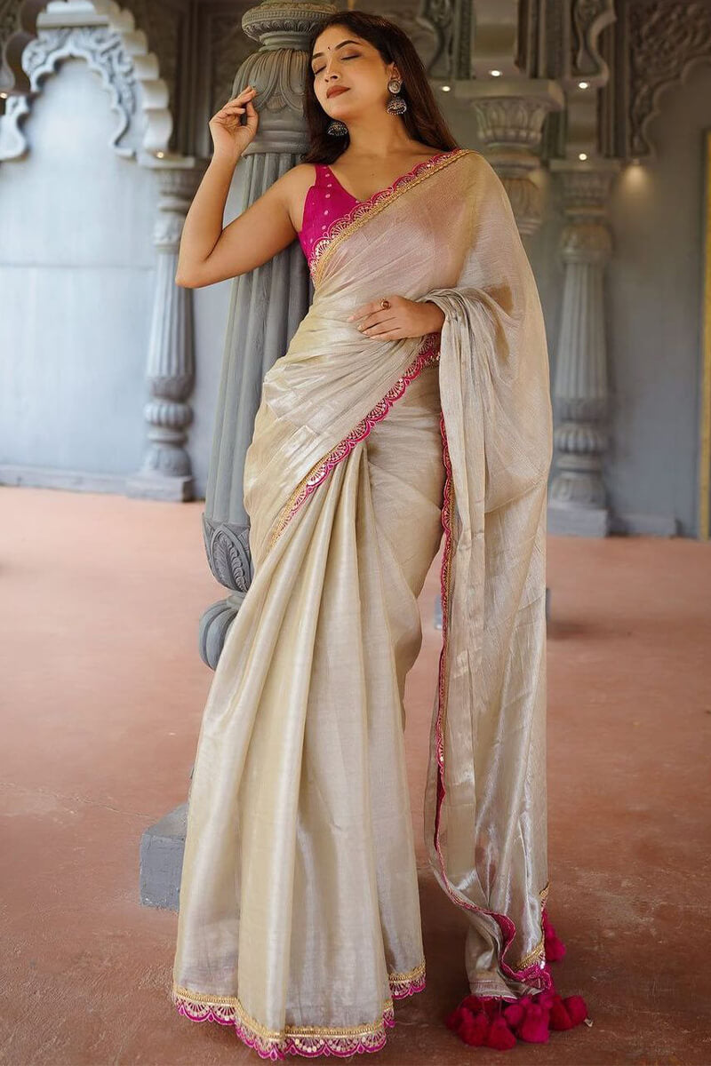 Groovy Beige Tissue Silk Saree With Pulsating Blouse Piece