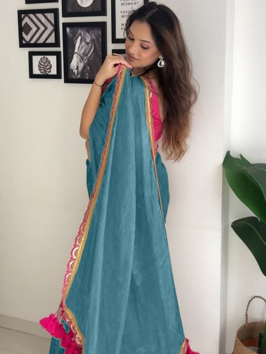 Wonderful Firozi Tissue Silk Saree With Resplendent Blouse Piece