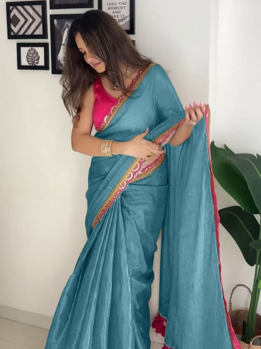 Wonderful Firozi Tissue Silk Saree With Resplendent Blouse Piece
